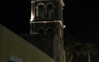 Mission building at night