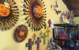 Artesinal arts & crafts on wall of a gift shop